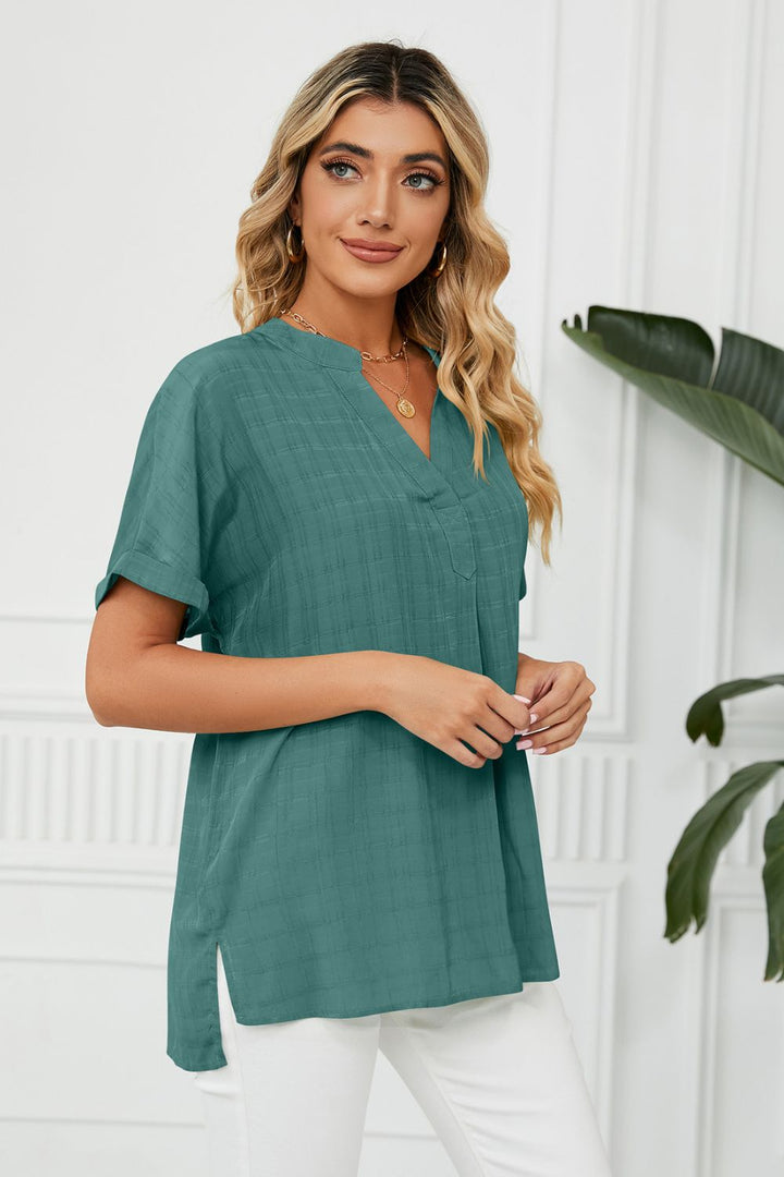 Notched neck cuffed short sleeve blouse with side slits