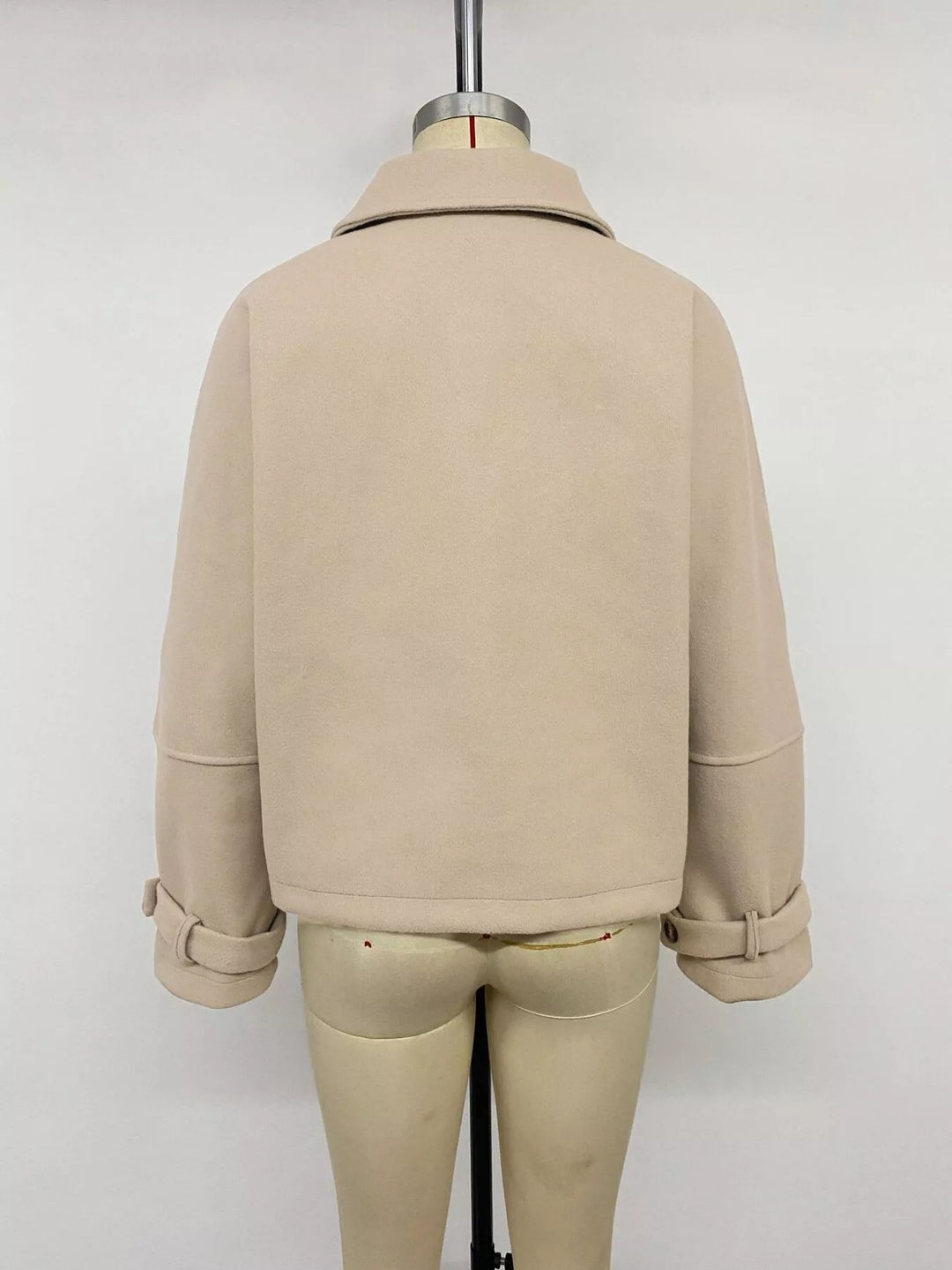 Cropped collared button-up jacket with cuff tabs