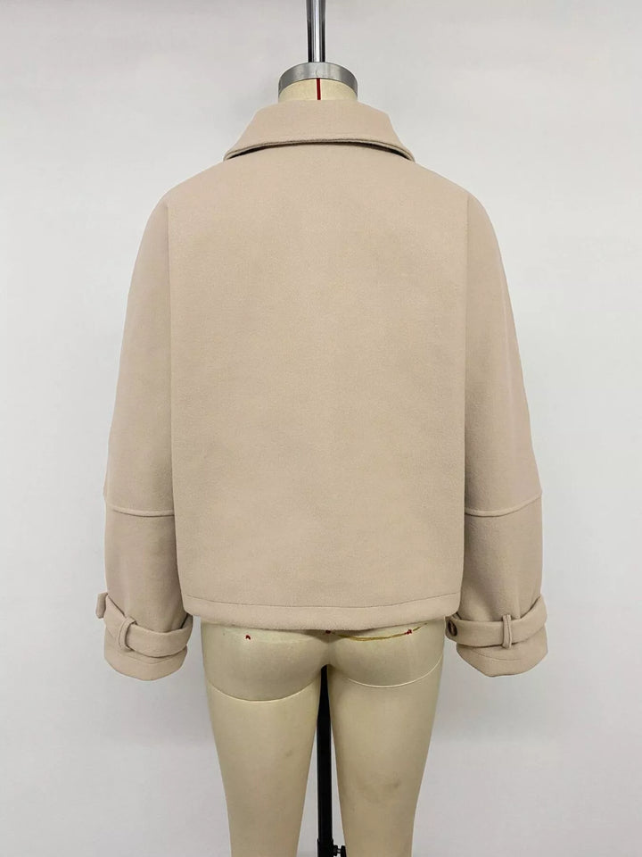 Cropped collared button-up jacket with cuff tabs