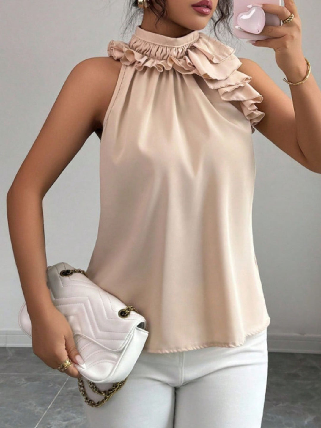 Flowy ruffle-trim high-neck sleeveless blouse