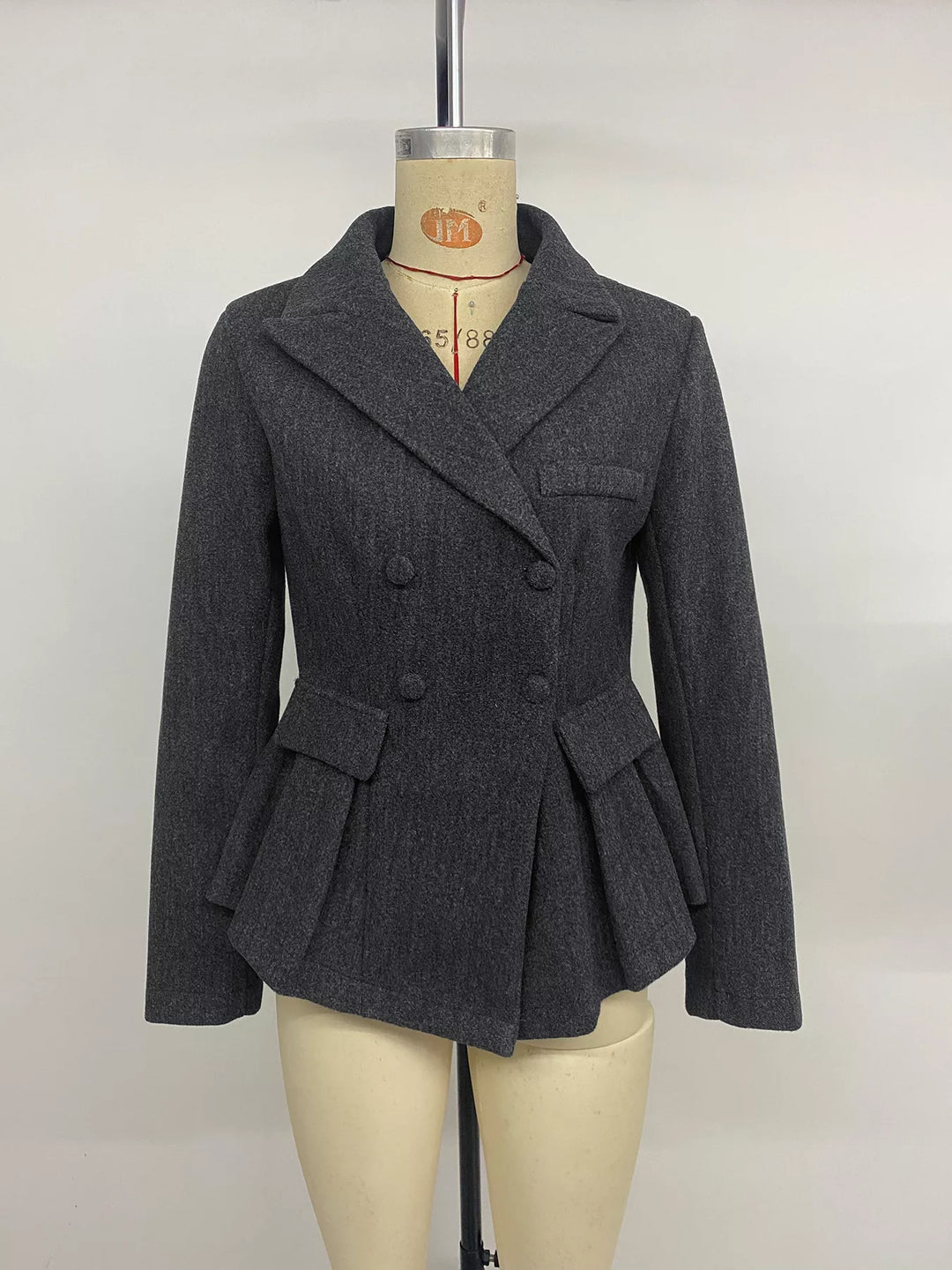 Double-breasted peplum blazer with notch lapel and flap pockets