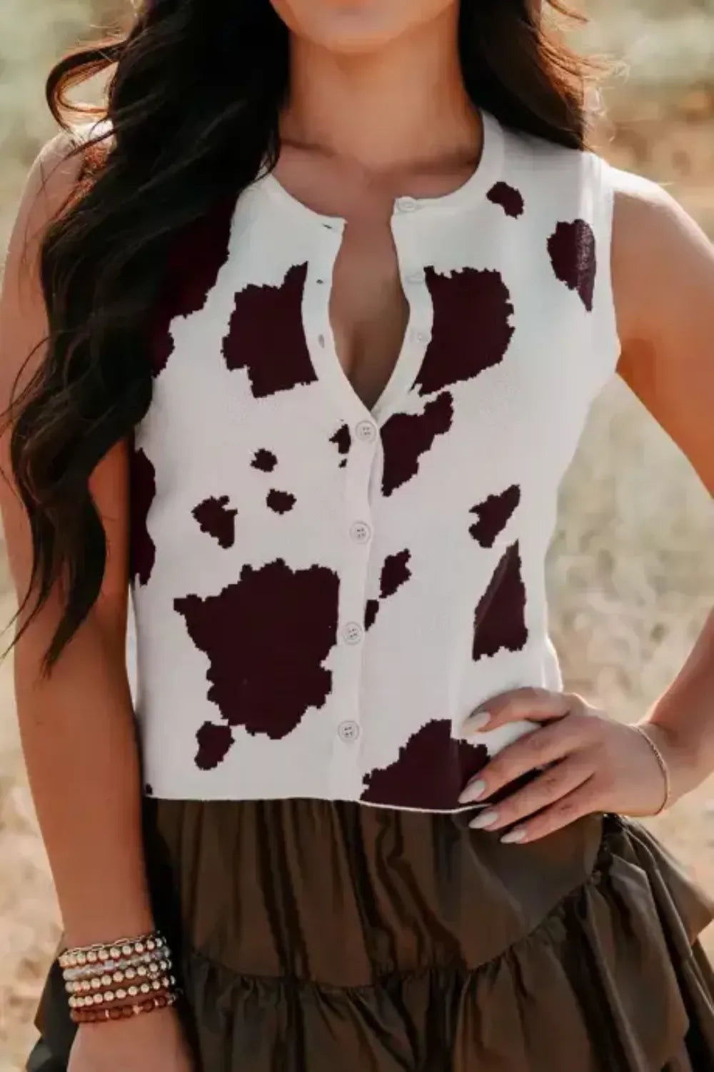 Cow print button-front sleeveless sweater vest