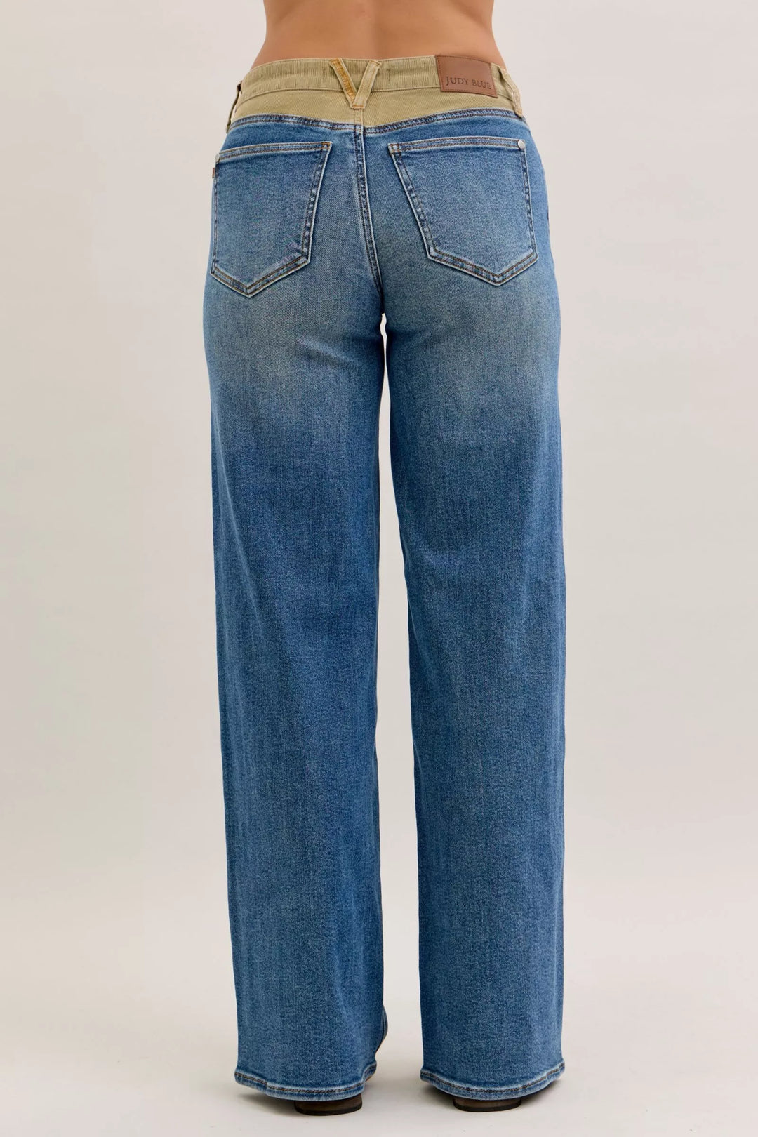 Mid-rise straight leg jeans with corduroy waistband