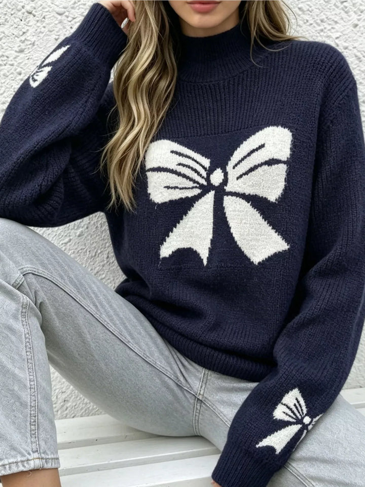 Bow intarsia mock neck knit sweater with drop shoulders