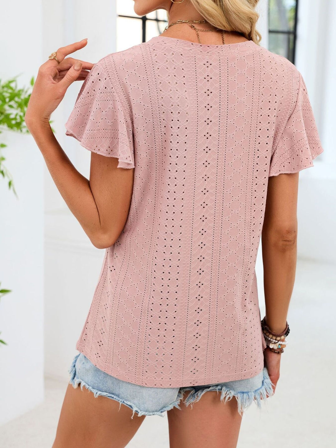 Eyelet flutter sleeve V-neck top with ruched neckline