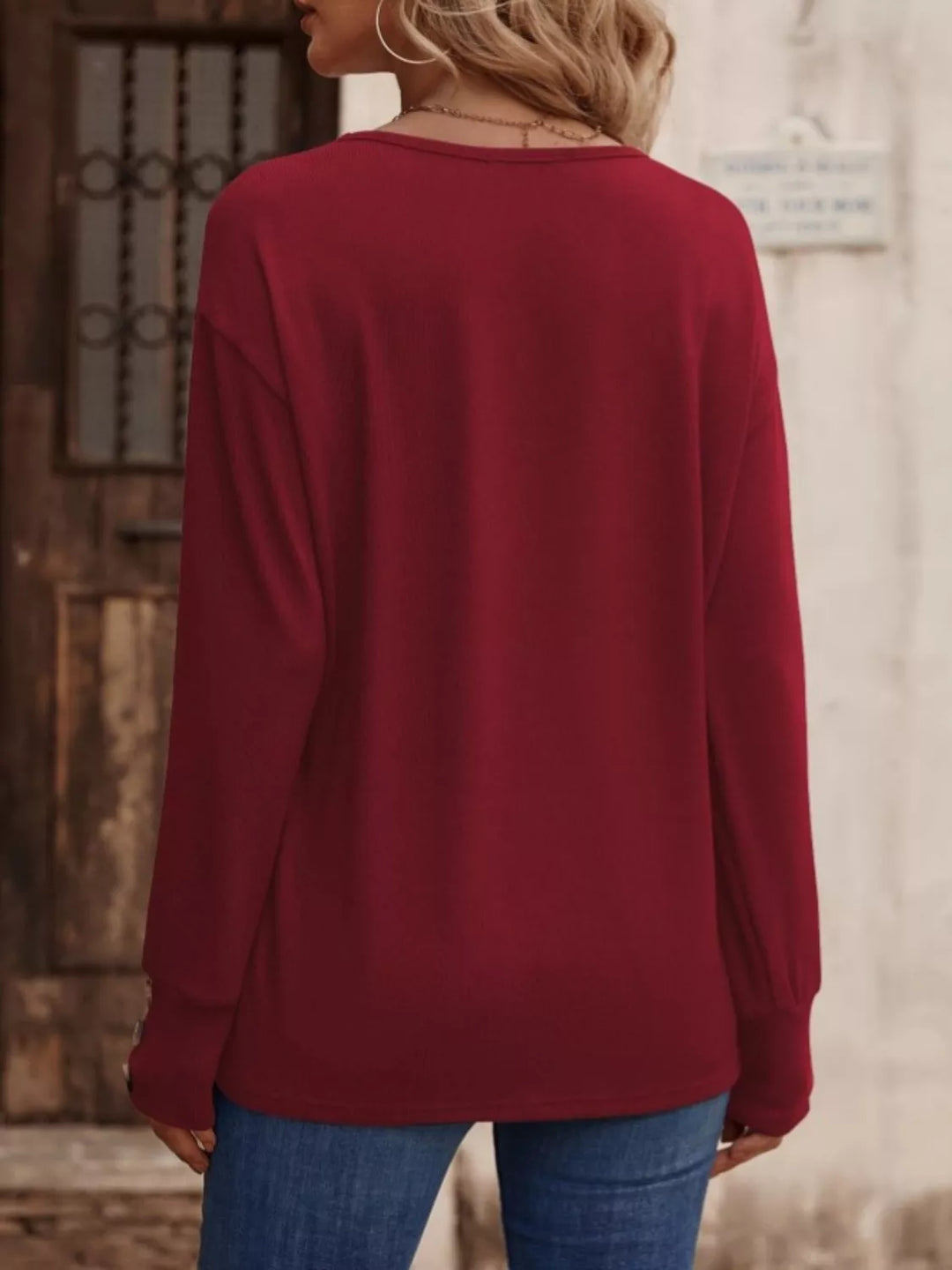 V-neck long sleeve top with button cuffs