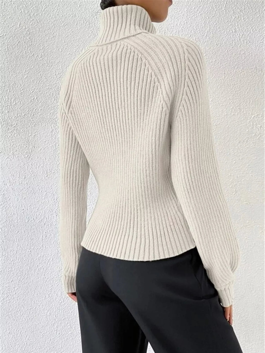 Ribbed knit turtleneck sweater with fitted long sleeves