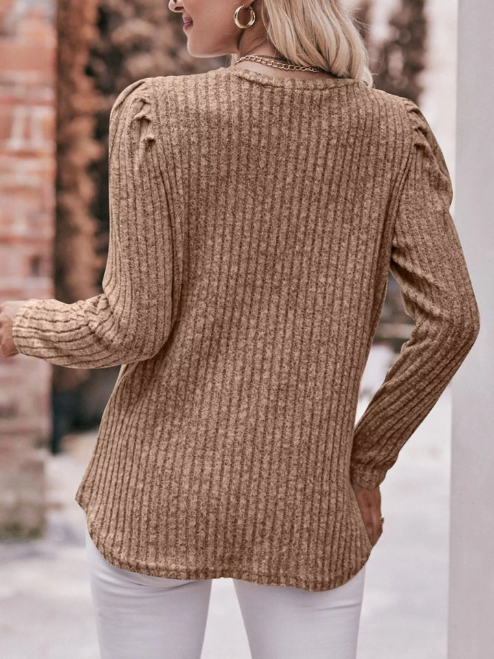 Ribbed knit long sleeve top with puff shoulders
