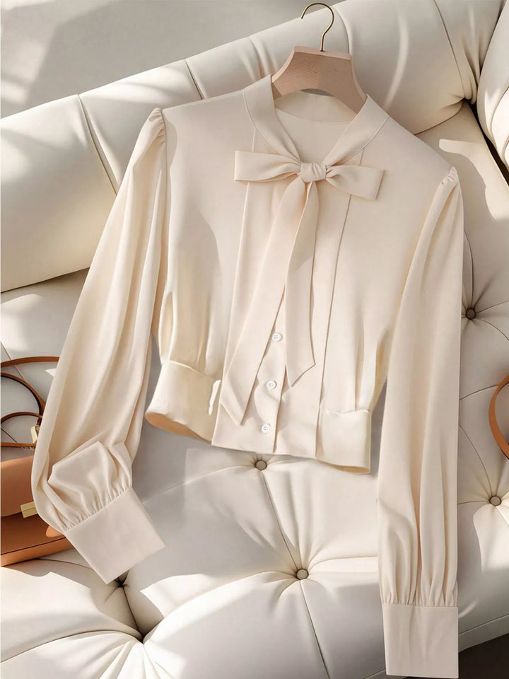 Puff sleeve bow-tie neck button-front blouse