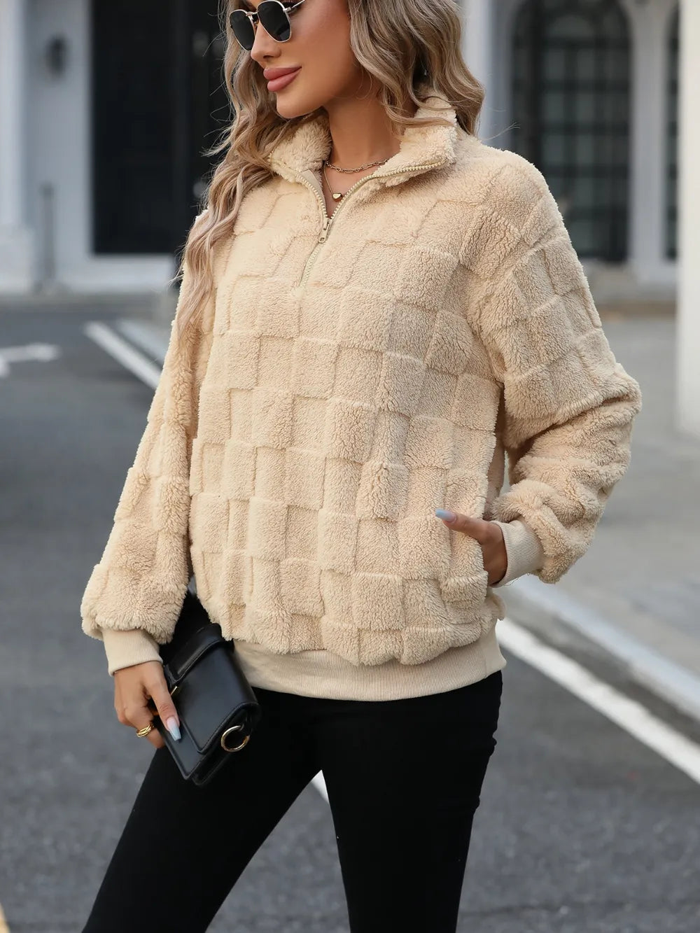 Fuzzy checkered quarter-zip pullover sweatshirt with pockets