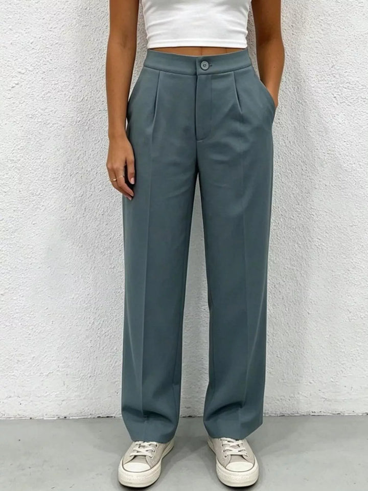 High-rise pleated wide-leg trousers with side pockets