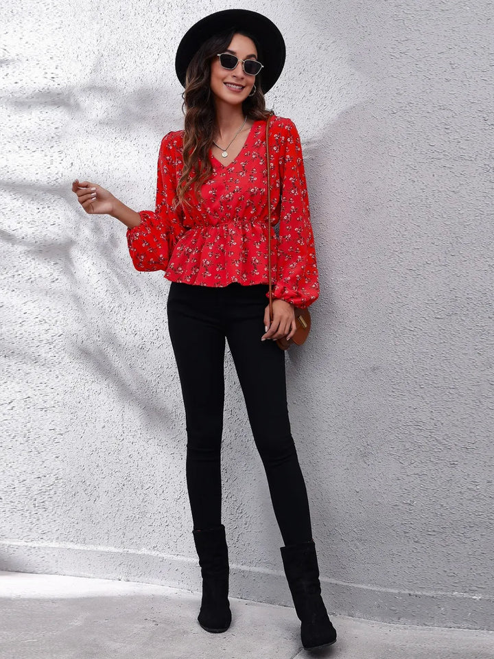 Floral peplum blouse with V-neck and balloon sleeves