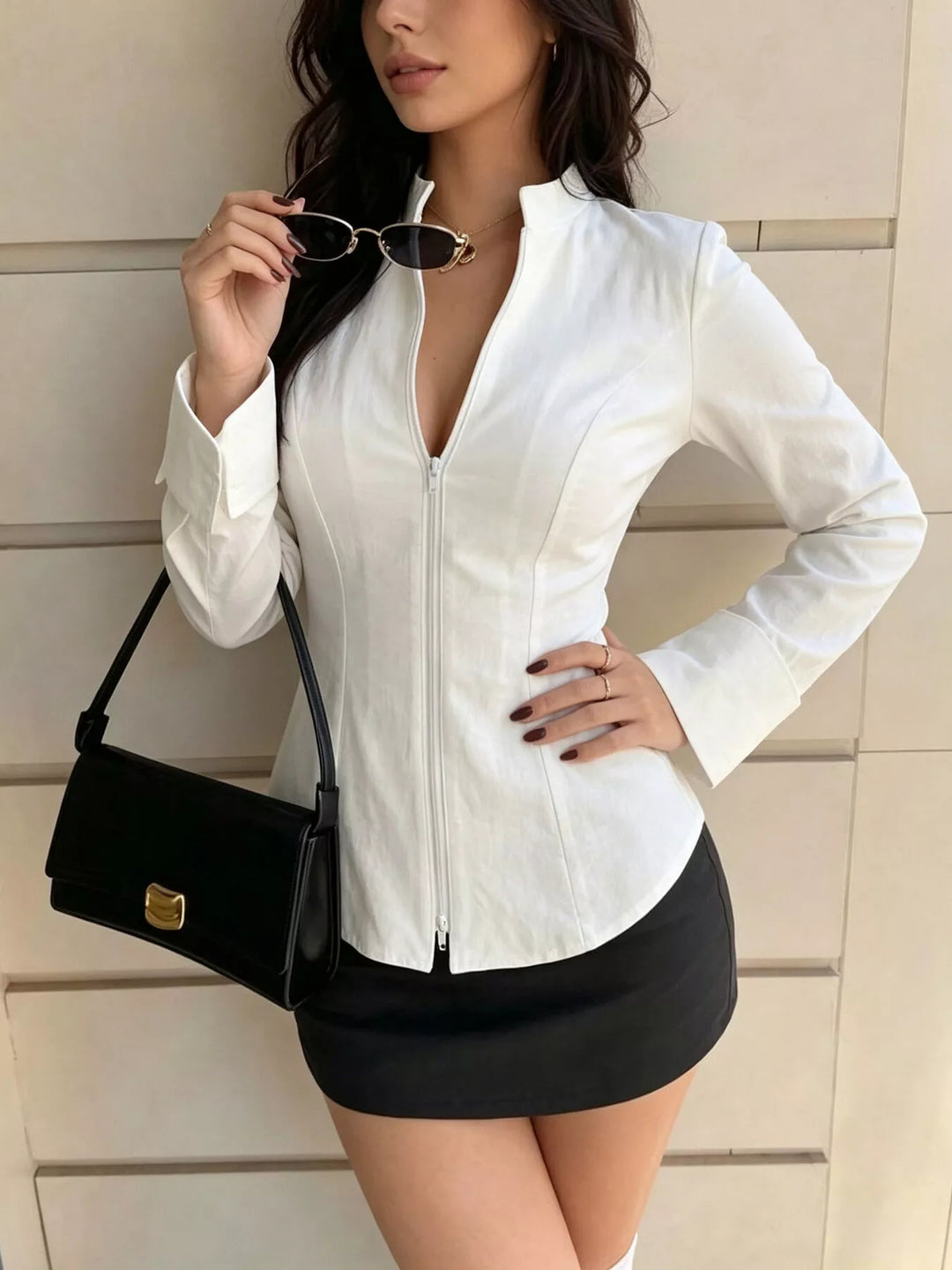 Zip-front mock neck top with flared cuffs