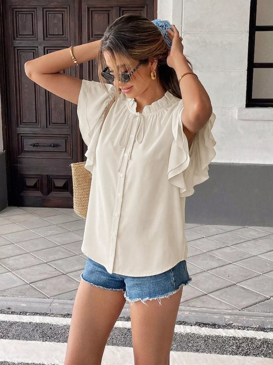 Ruffle sleeve tie-neck button-down blouse