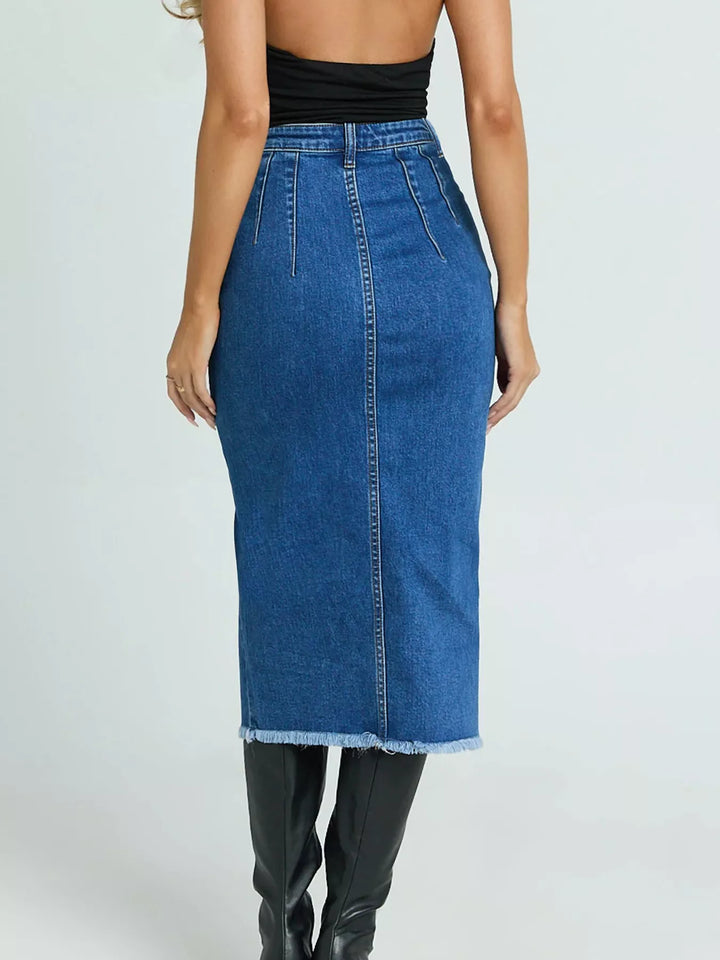 High-waist denim midi skirt with front slit and raw hem