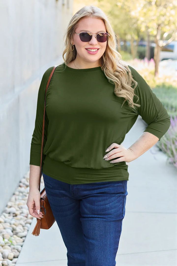 Batwing sleeve top with banded blouson hem