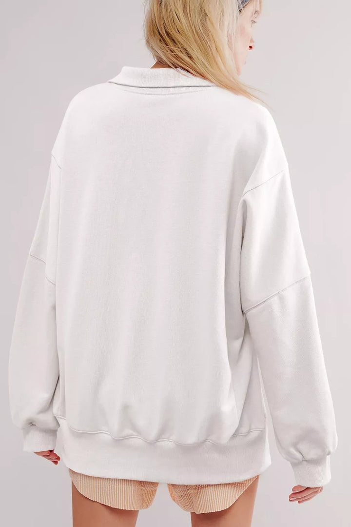 Buttoned collar raw seam high-low baggy sweatshirt with slits