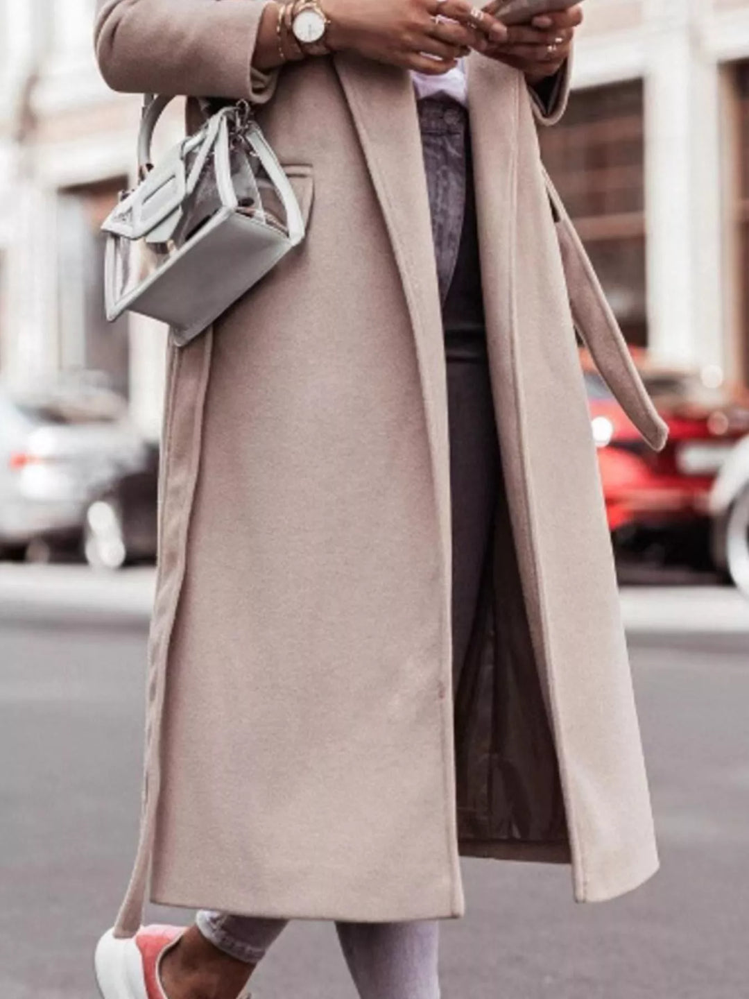 Tie-waist longline coat with notched lapels and pockets