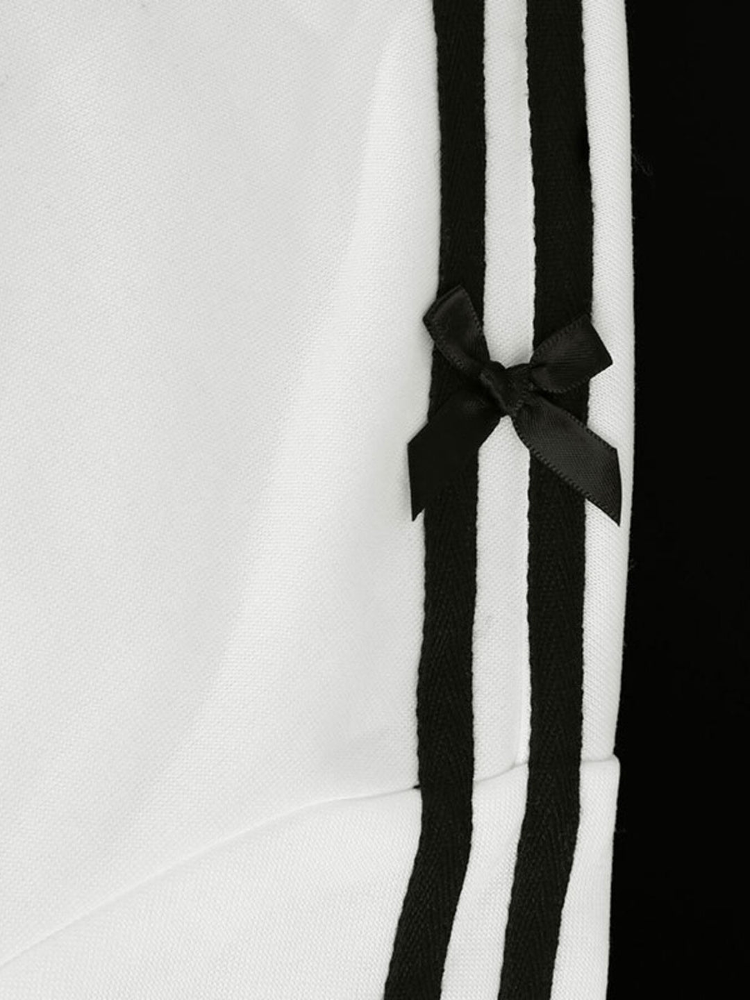 Zip-up hoodie with striped sleeves and bow detail