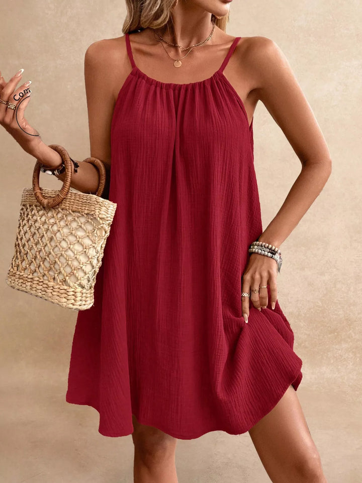 Backless crinkle spaghetti strap mini dress