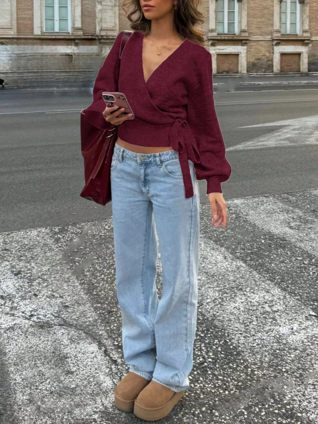 Tie-waist surplice wrap sweater with balloon sleeves