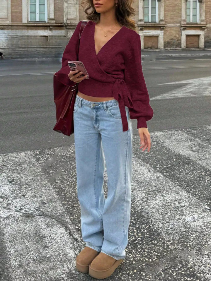 Tie-waist surplice wrap sweater with balloon sleeves