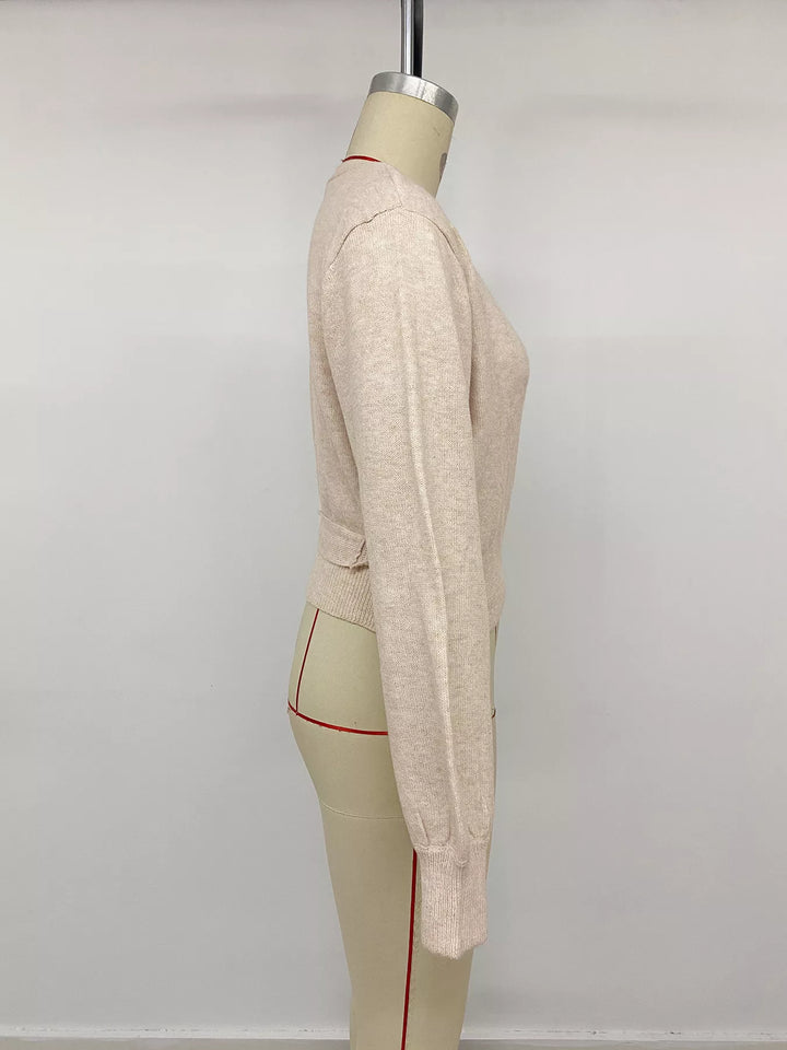 Surplice wrap sweater with side tie and drop shoulders