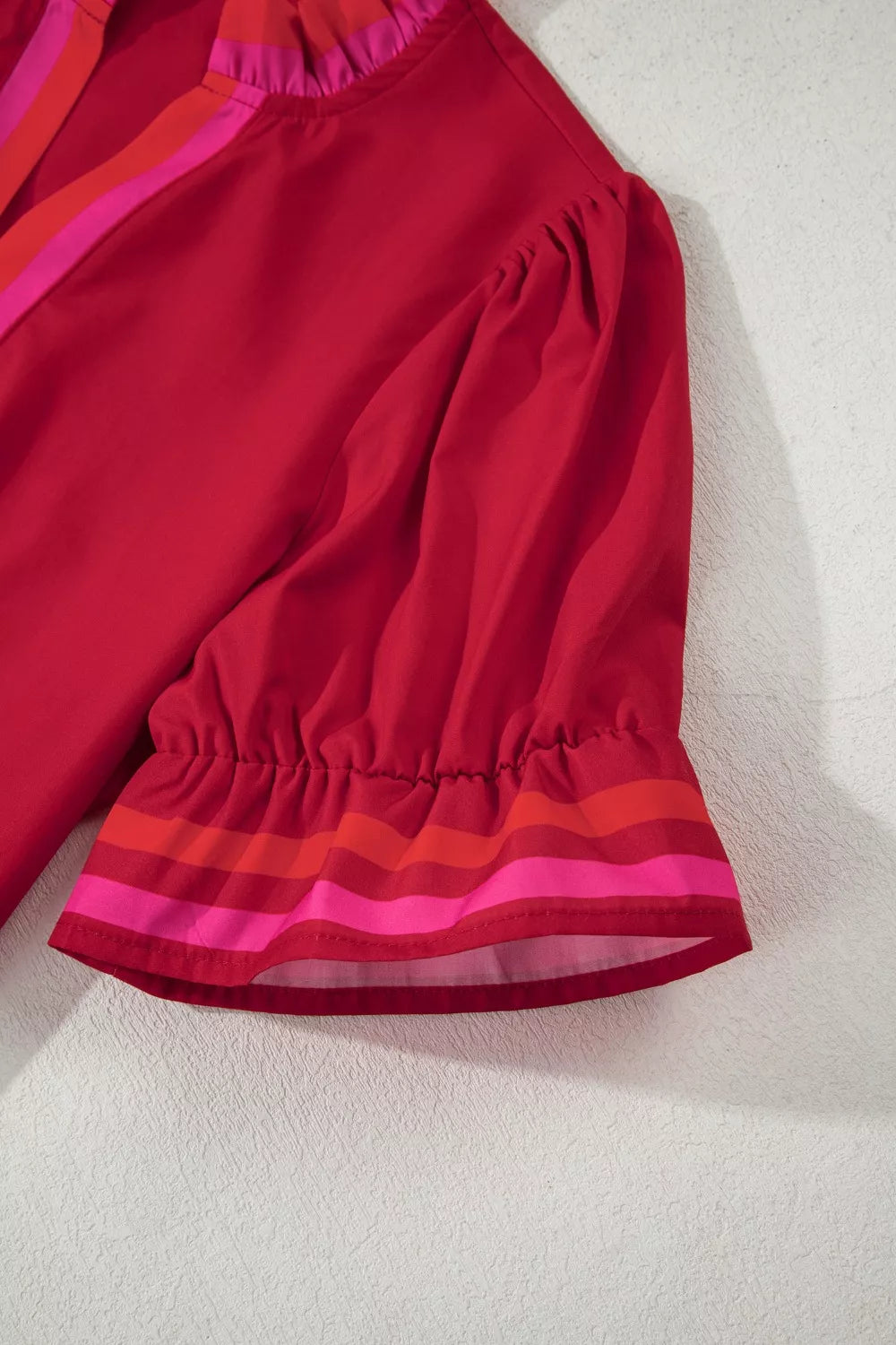Puff sleeve notched blouse with striped ruffle cuffs