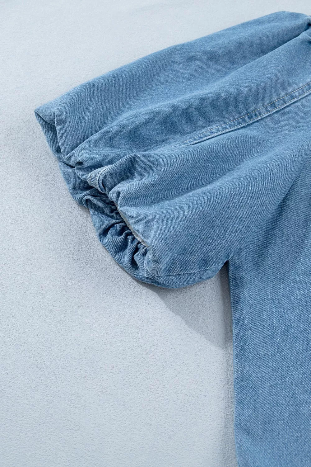 Button-down puff sleeve denim mini dress with ruffle hem