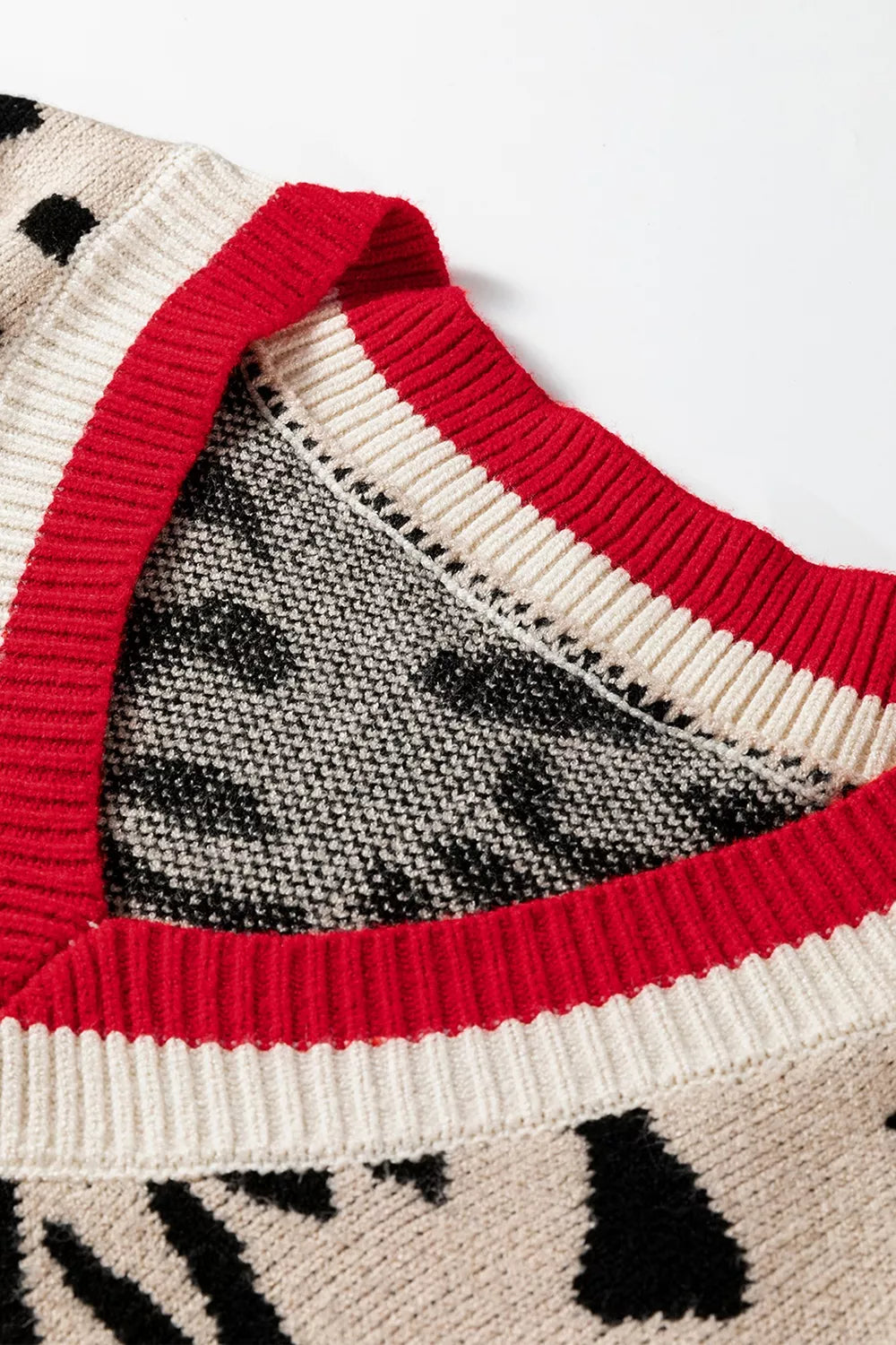 Leopard print v-neck sweater with contrast varsity rib trim
