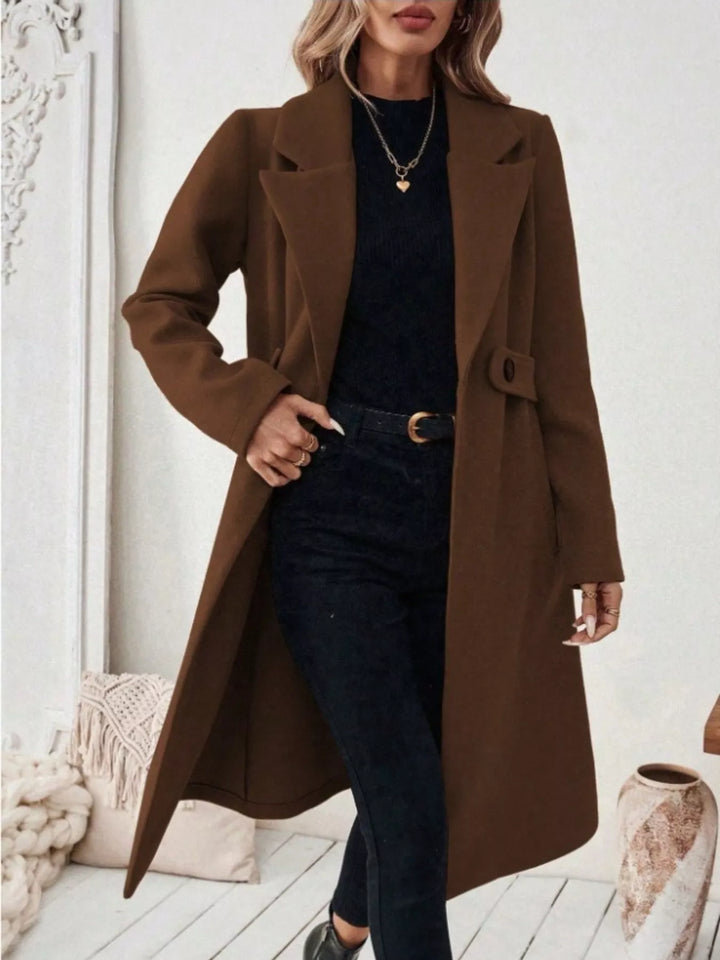 Notched lapel belted longline coat with side pockets