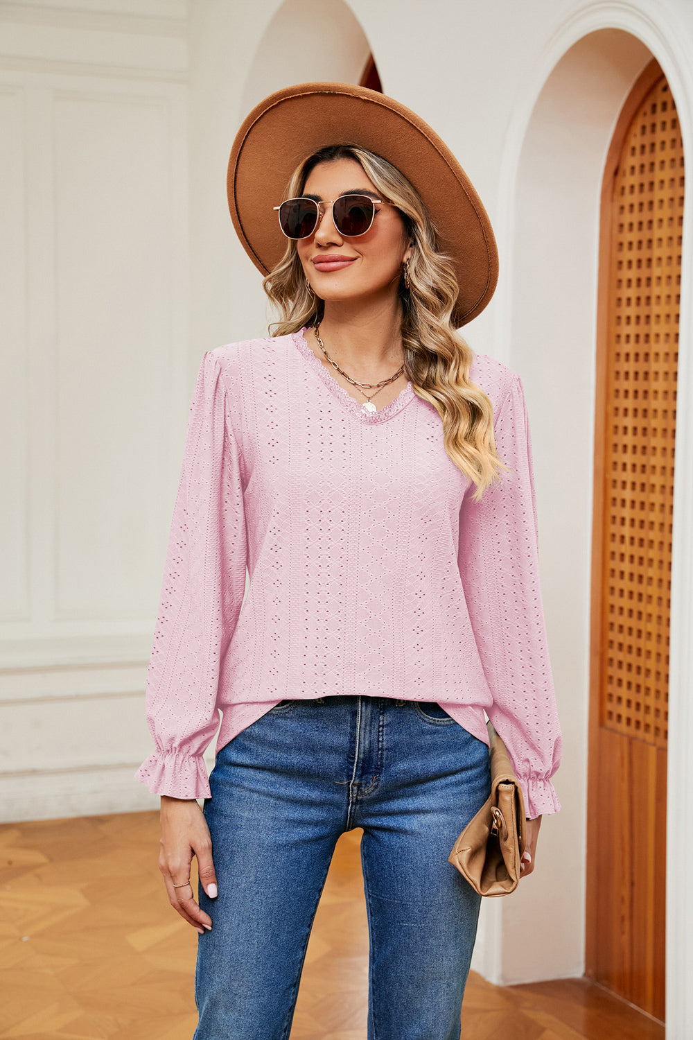 Eyelet V-neck blouse with flounce sleeves and lace trim