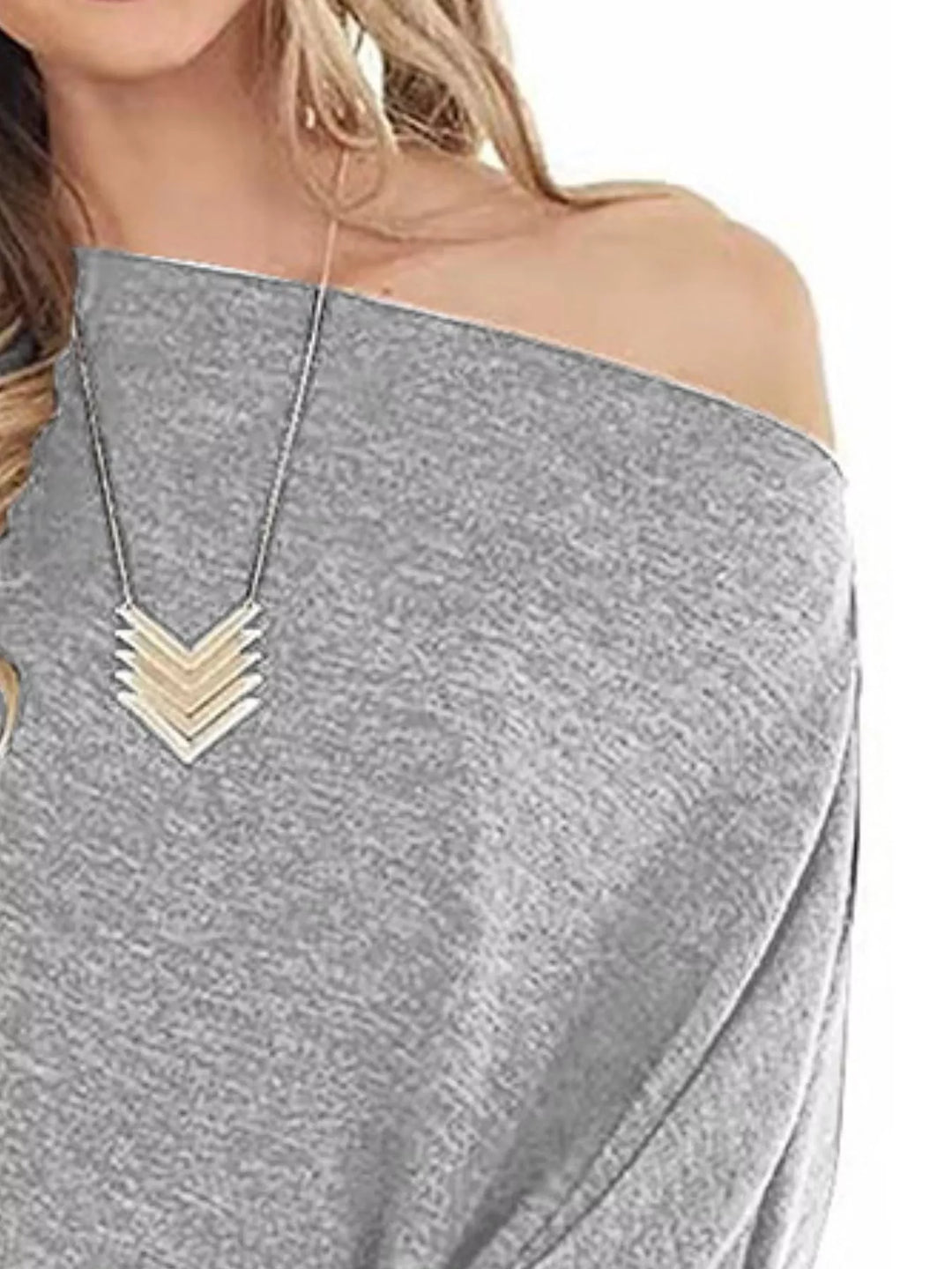 One-shoulder long sleeve top with button-cuff detail