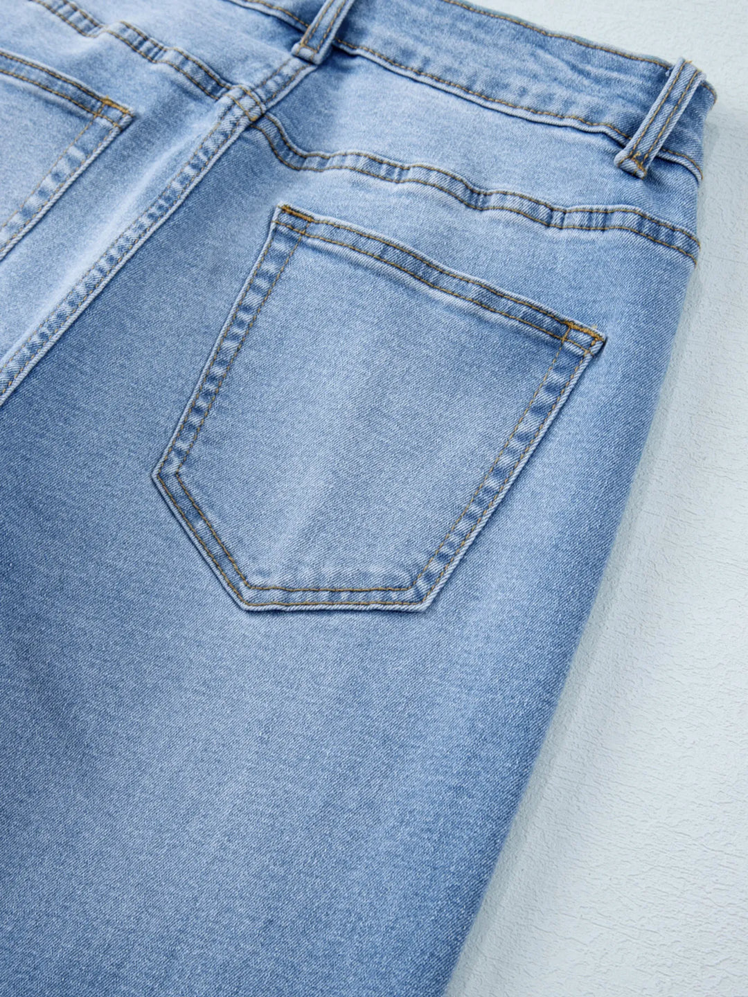 High-rise wide-leg jeans with released hem