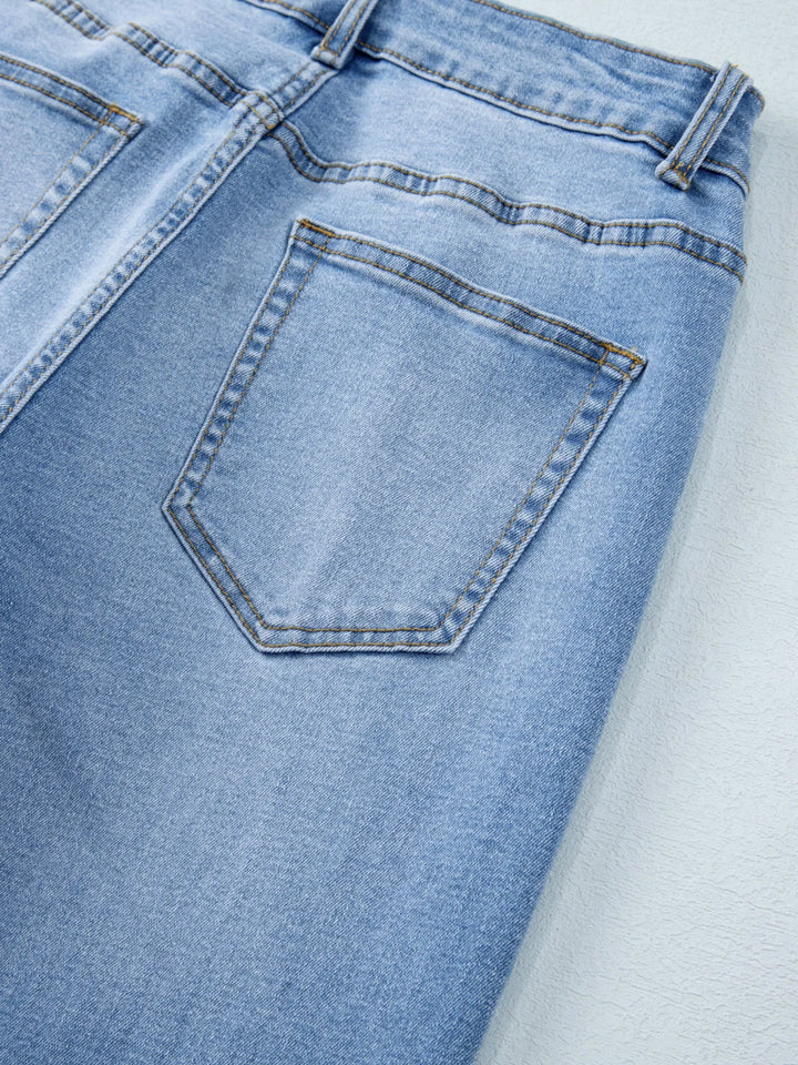 High-rise wide-leg jeans with released hem