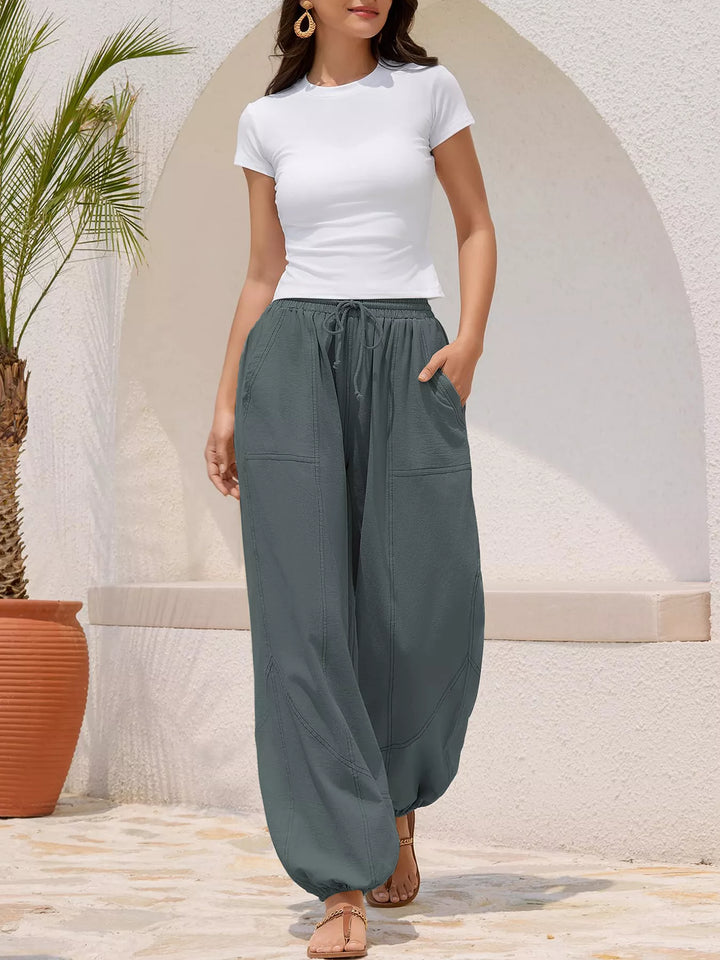 Drawstring waist wide-leg harem joggers with side pockets