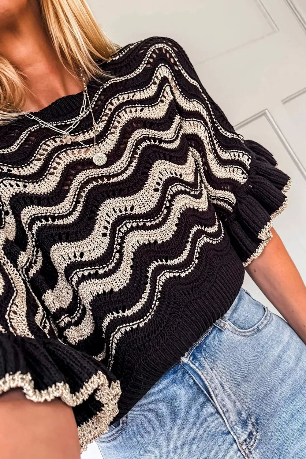Openwork wave-knit sweater with tiered ruffle sleeves