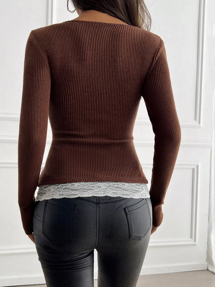 Ribbed knit long sleeve top with lace trim and button placket
