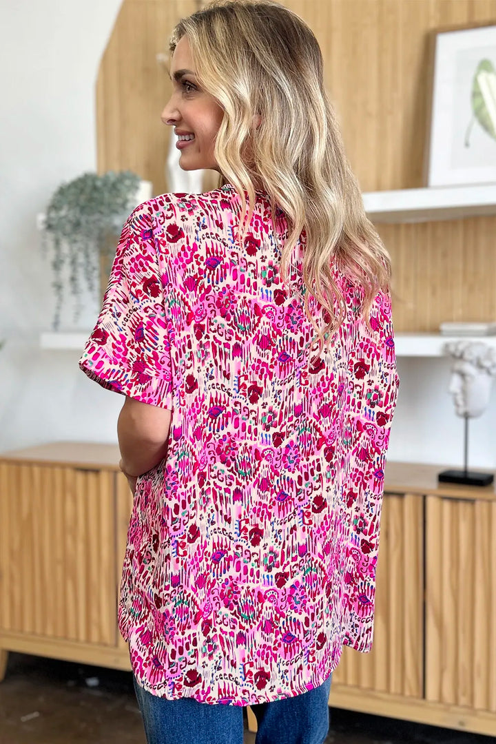 Abstract print V-neck short sleeve tunic blouse