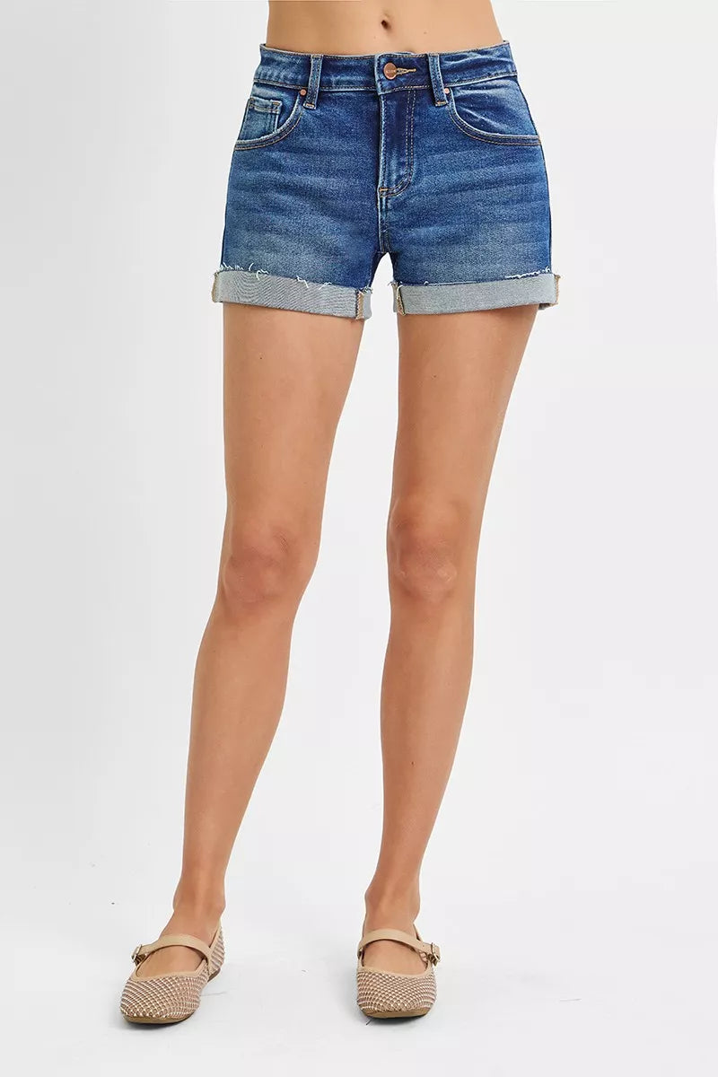 Cuffed low-rise denim shorts with raw hem detail