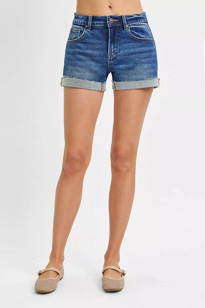 Cuffed low-rise denim shorts with raw hem detail