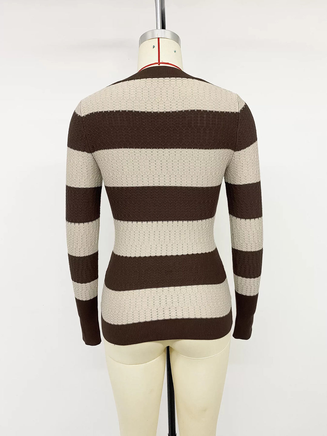 Striped cable knit v-neck pullover with ribbed trim