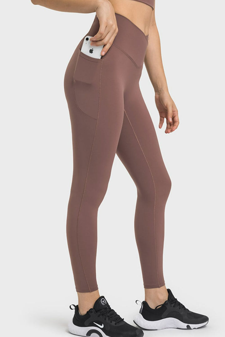 Crossover V-waist yoga leggings with side pockets