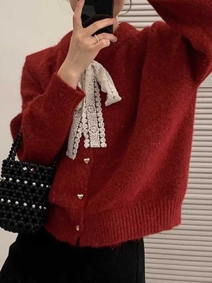 Lace bow knit cardigan with gold heart buttons