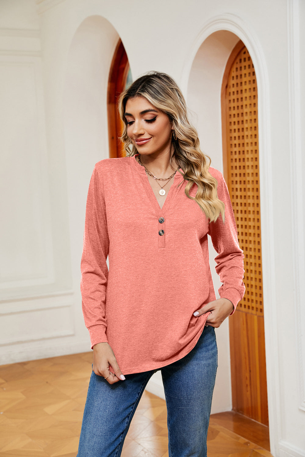 Notch neck long sleeve top with button placket