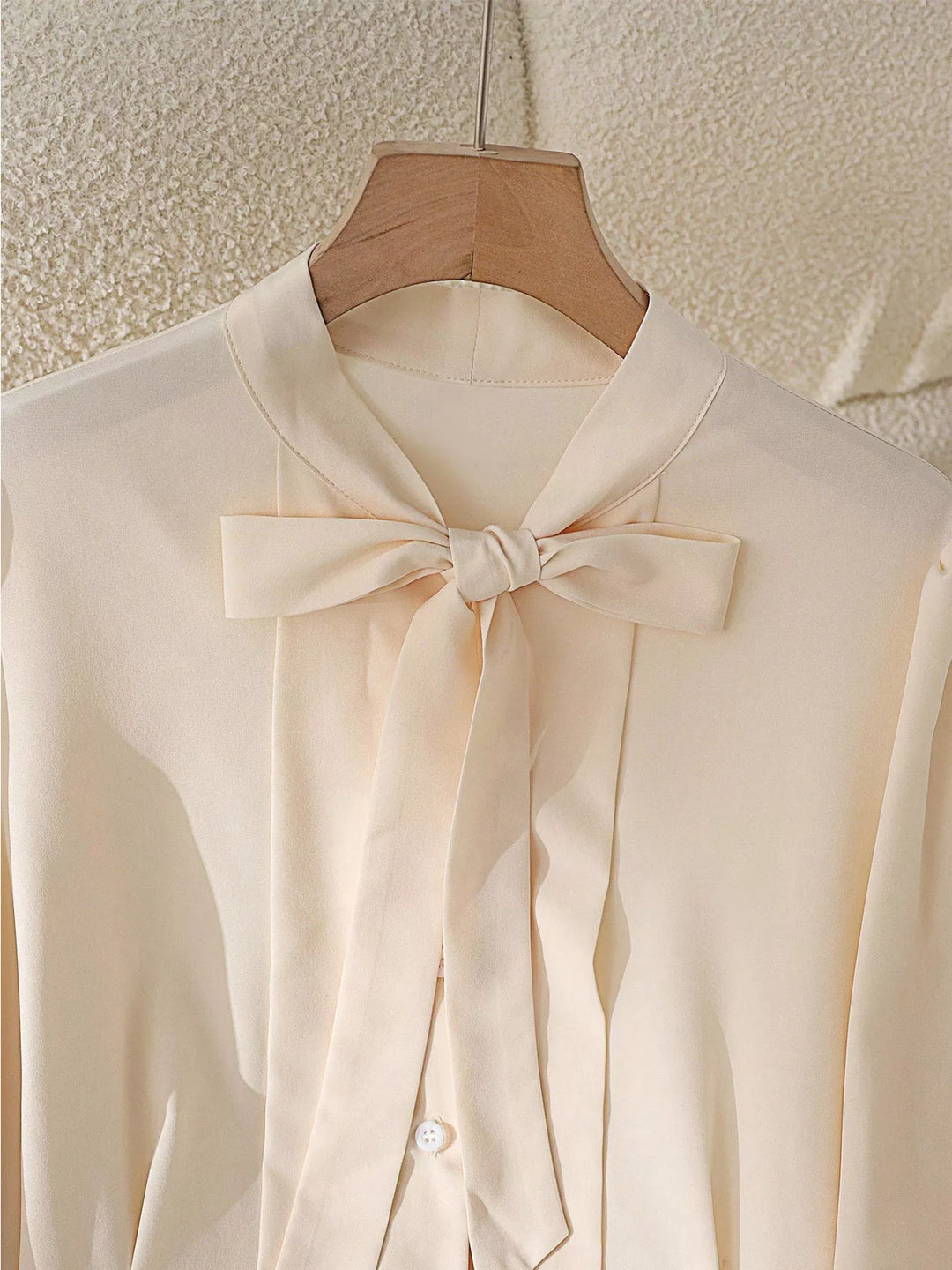 Puff sleeve bow-tie neck button-front blouse