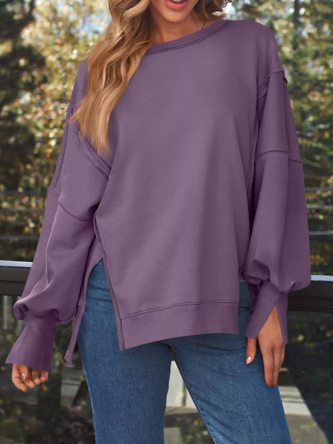 Oversized side-slit sweatshirt with exposed seams