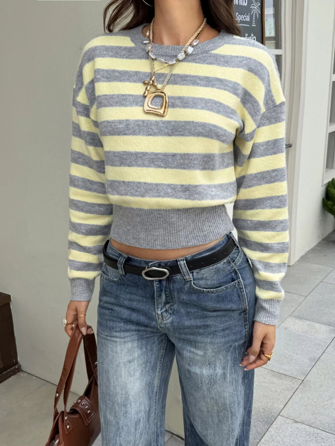 Striped cropped sweater with ribbed hem and drop shoulders