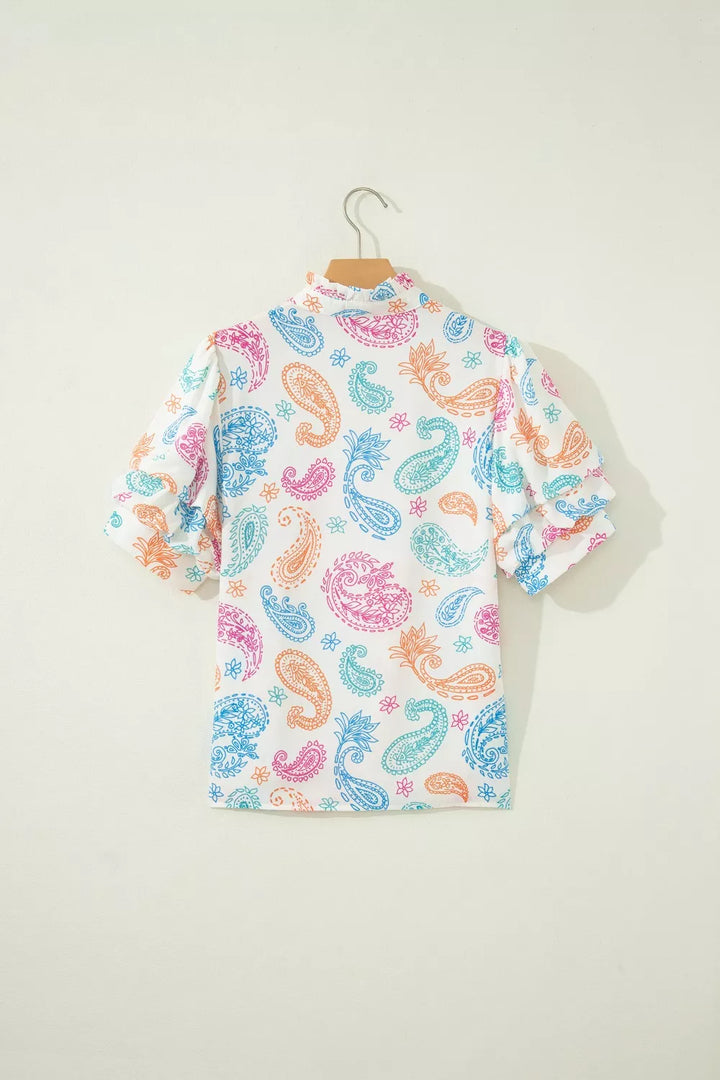 Paisley print keyhole blouse with ruffle neck and puff sleeves