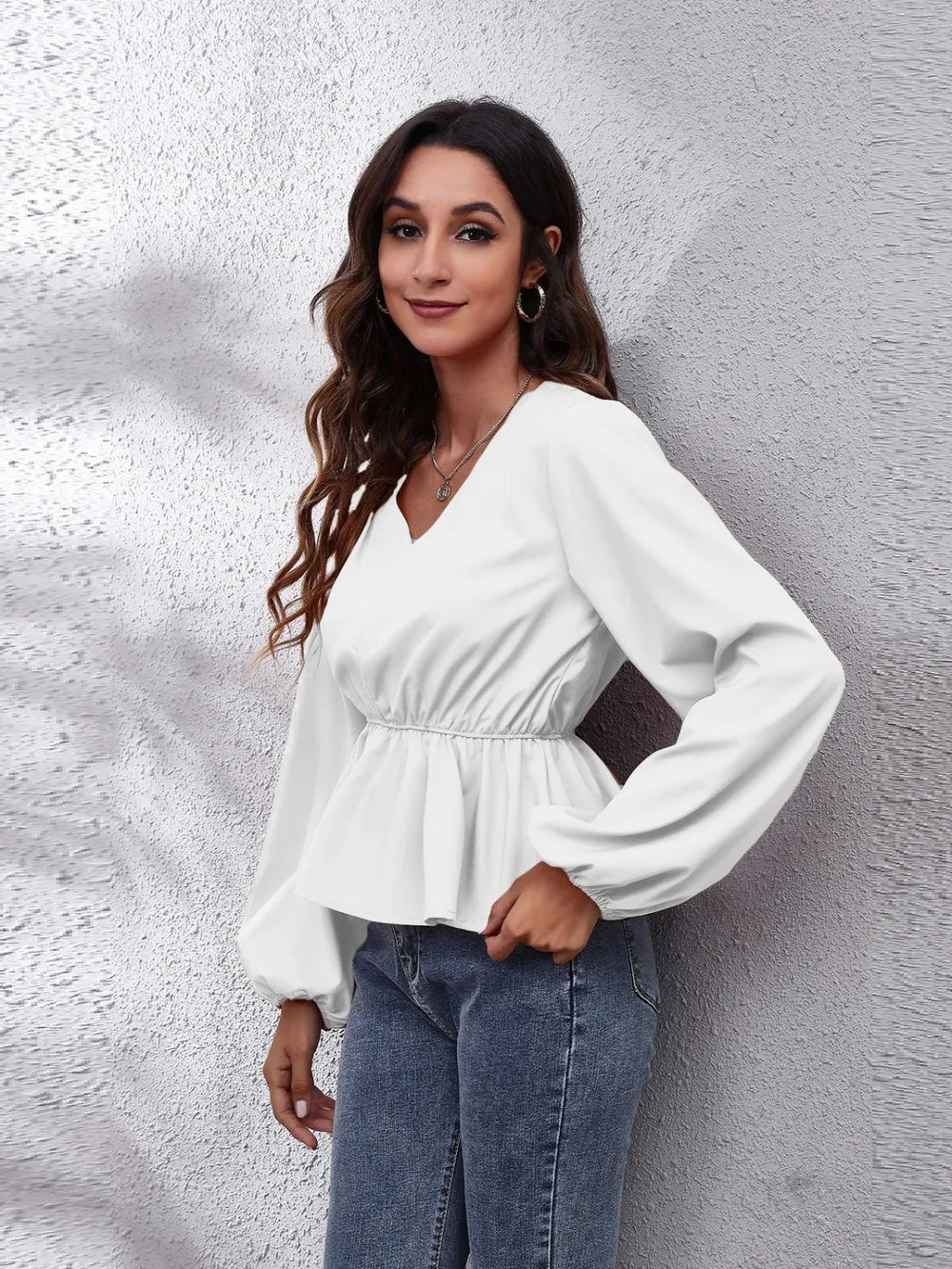 Balloon sleeve peplum blouse with V-neck